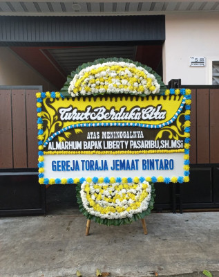 Papan Bunga Duka di Lubai